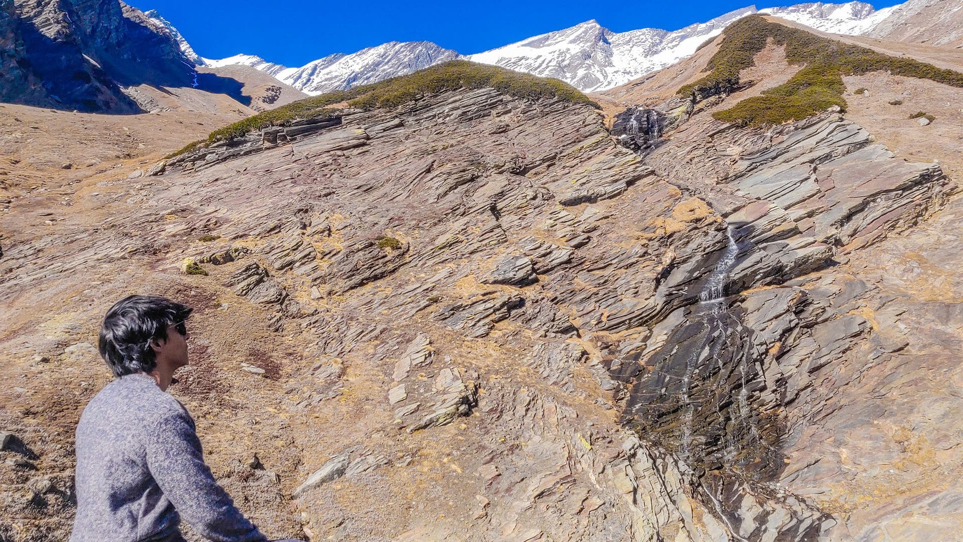 Sitting beside Frozen Beas Kund